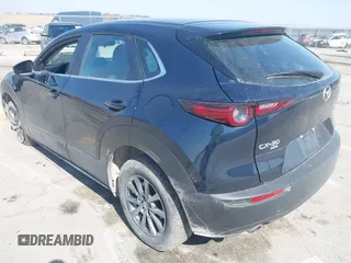 2023 Mazda CX-30 S with VIN 3MVDMBAM6PM579780, listed as a IAAI auction lot 41780720 with 32,603 mi miles and . Bid and sale history available at DreamBid. Image 3.