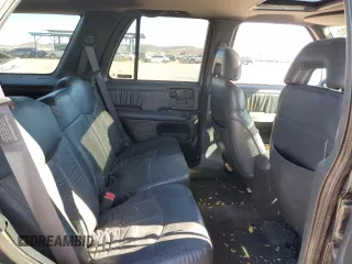 1997 GMC Jimmy SLS with VIN 1GKDT13W8V2560329, listed as a Copart auction lot 80992204 with 231,051 mi miles and Salvage Title. Bid and sale history available at carsss.com. Image 10.
