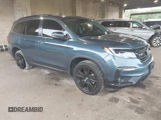 2021 Honda Pilot Special Edition with VIN 5FNYF6H27MB096582, listed as a IAAI auction lot 42315704 with 69,793 mi miles and . Bid and sale history available at DreamBid. Image 1.