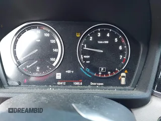 2021 BMW X1 xDrive28i with VIN WBXJG9C02M3M42379, listed as a IAAI auction lot 42476221 with 60,412 mi miles and . Bid and sale history available at DreamBid. Image 7.