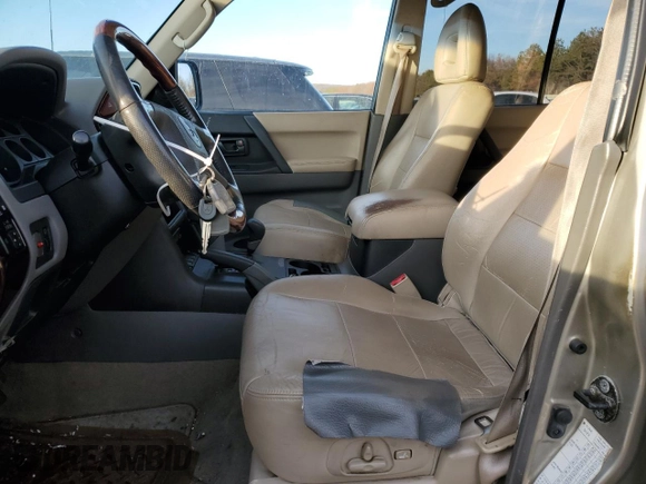 2002 Mitsubishi Montero Limited z VIN JA4MW51R12J020808, wystawiony jako Copart lot #41915255 z przebiegiem 127 834 mil mil oraz Czysty tytuł • Clean title. Historia ofert i sprzedaży dostępna na DreamBid. Obrazek 7.
