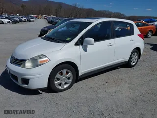 2009 Nissan Versa 1.8 SL with VIN 3N1BC13E19L404019, listed as a IAAI auction lot 41872871 with 192,158 mi miles. Bid and sale history available at carsss.com. Image 2.
