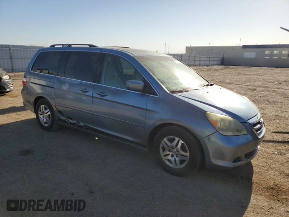 2005 Honda Odyssey EX-L with VIN 5FNRL38765B072878, listed as a Copart auction lot 54610815 with 271,460 mi miles and Salvage title. Bid and sale history available at DreamBid. Image 4.