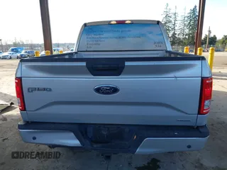 2015 Ford F-150 XLT with VIN 1FTEW1C86FKE85267, listed as a IAAI auction lot 41527996 with 119,800 mi miles and . Bid and sale history available at carsss.com. Image 16.