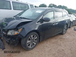 2015 Honda Odyssey Touring Elite with VIN 5FNRL5H90FB065004, listed as a IAAI auction lot 42461597 with 317,523 mi miles and . Bid and sale history available at DreamBid. Image 17.