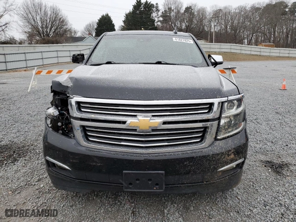 2017 Chevrolet Tahoe Premier with VIN 1GNSCCKC8HR264753, listed as a Copart auction lot 41827825 with 129,187 mi miles and Salvage Title. Bid and sale history available at carsss.com. Image 5.