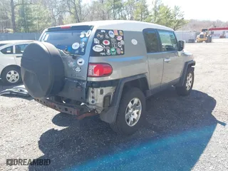 2010 Toyota FJ Cruiser with VIN JTEBU4BF6AK074479, listed as a IAAI auction lot 41843444 with 161,245 mi miles. Bid and sale history available at carsss.com. Image 4.