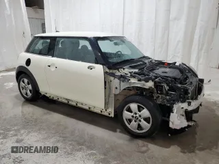 2015 MINI Hardtop with VIN WMWXM5C58FT973235, listed as a Copart auction lot 49988015 with 119,683 mi miles and Salvage Title. Bid and sale history available at DreamBid. Image 4.