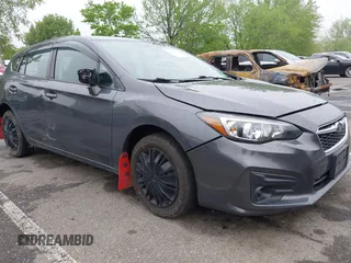 2019 Subaru Impreza with VIN 4S3GTAA69K1711062, listed as a IAAI auction lot 42187136 with 91,423 mi miles and . Bid and sale history available at DreamBid. Image 1.