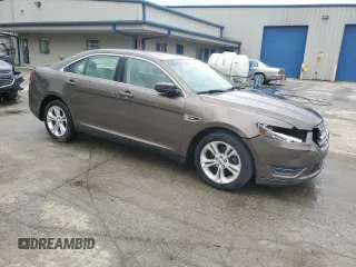 2015 Ford Taurus SEL z VIN 1FAHP2E84FG102075, wystawiony jako Copart lot #59740265 z przebiegiem 90 669 mil mil oraz Szkoda całkowita • Salvage title. Historia ofert i sprzedaży dostępna na DreamBid. Obrazek 4.