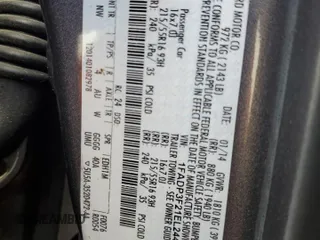 2014 Ford Focus SE with VIN 1FADP3F21EL244324, listed as a Copart auction lot 48793795 with 69,809 mi miles and Salvage Title. Bid and sale history available at carsss.com. Image 12.