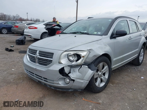 2011 Dodge Caliber Mainstreet with VIN 1B3CB3HA2BD238032, listed as a IAAI auction lot 41865918 with 98,022 mi miles and . Bid and sale history available at DreamBid. Image 6.