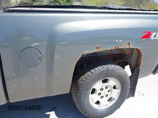 2011 Chevrolet Silverado 1500 LT with VIN 1GCRKSE36BZ417931, listed as a IAAI auction lot 42143166 with 180,033 mi miles and . Bid and sale history available at DreamBid. Image 6.