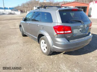 2013 Dodge Journey American Value Pkg with VIN 3C4PDCAB3DT556607, listed as a IAAI auction lot 41519379 with 80,265 mi miles. Bid and sale history available at carsss.com. Image 3.