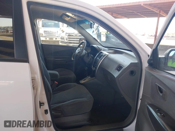 2006 Hyundai Tucson GLS with VIN KM8JN12D16U332117, listed as a IAAI auction lot 41831236 with 160,557 mi miles. Bid and sale history available at carsss.com. Image 5.