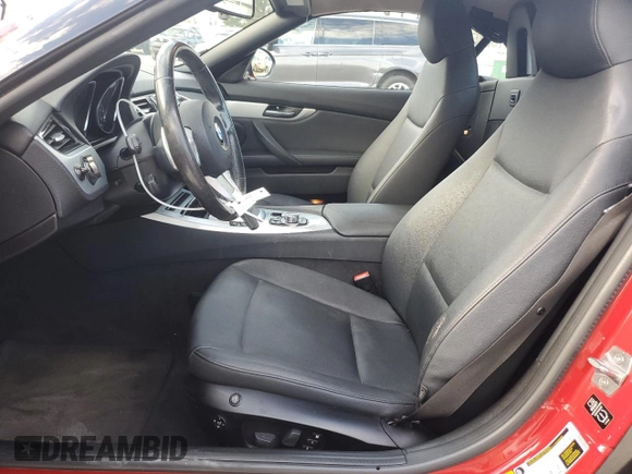 2014 BMW Z4 sDrive28i with VIN WBALL5C57EP556519, listed as a Copart auction lot 88090055 with 124,767 mi miles and Salvage Title. Bid and sale history available at carsss.com. Image 7.