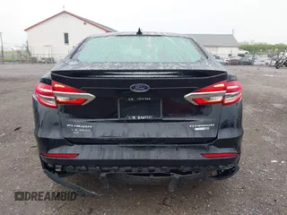 2019 Ford Fusion Titanium with VIN 3FA6P0D92KR125864, listed as a IAAI auction lot 42425422 with 109,340 mi miles and . Bid and sale history available at DreamBid. Image 16.