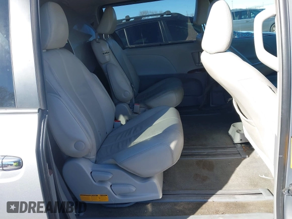 2012 Toyota Sienna XLE AAS z VIN 5TDYK3DC7CS277944, wystawiony jako IAAI lot #41311855 z przebiegiem 224 239 mil mil oraz . Historia ofert i sprzedaży dostępna na DreamBid. Obrazek 8.