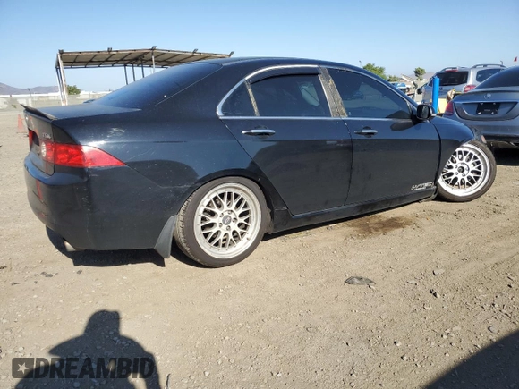 2004 Acura TSX w/Navigation with VIN JH4CL96994C005103, listed as a Copart auction lot 57911445 with 273,458 mi miles and Salvage title. Bid and sale history available at DreamBid. Image 3.