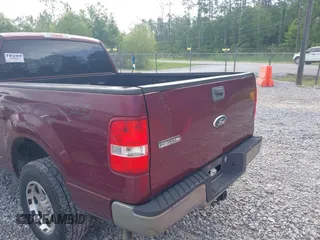 2006 Ford F-150 XL with VIN 1FTRF14W96NB07411, listed as a IAAI auction lot 42078713 with 238,462 mi miles. Bid and sale history available at carsss.com. Image 6.