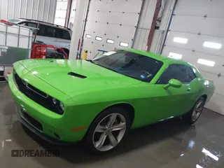 2017 Dodge Challenger SXT z VIN 2C3CDZAG2HH574239, wystawiony jako IAAI lot #41391595 z przebiegiem 92 377 mil mil oraz . Historia ofert i sprzedaży dostępna na DreamBid. Obrazek 14.