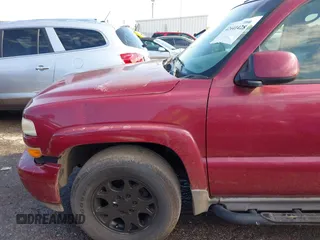2005 Chevrolet Tahoe Z71 z VIN 1GNEK13T25R225137, wystawiony jako IAAI lot #42441428 z przebiegiem 230 897 mil mil oraz . Historia ofert i sprzedaży dostępna na DreamBid. Obrazek 6.