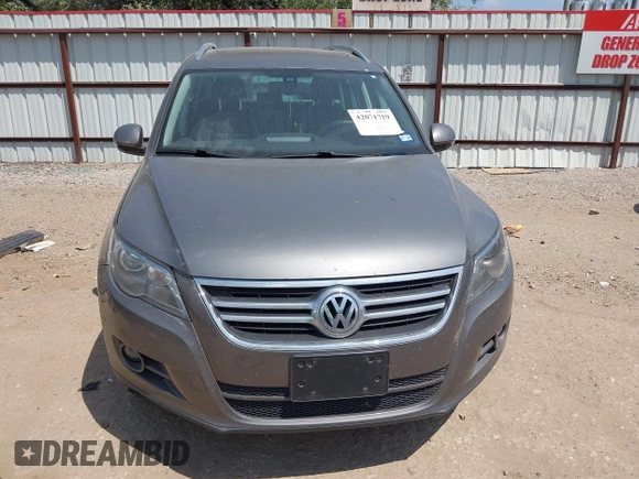 2011 Volkswagen Tiguan SEL w/Premium Navi with VIN WVGAV7AX0BW550059, listed as a IAAI auction lot 42071719 with 107,341 mi miles and . Bid and sale history available at DreamBid. Image 12.