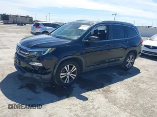 2016 Honda Pilot EX-L with VIN 5FNYF6H58GB018830, listed as a IAAI auction lot 41814636 with 147,242 mi miles. Bid and sale history available at carsss.com. Image 6.
