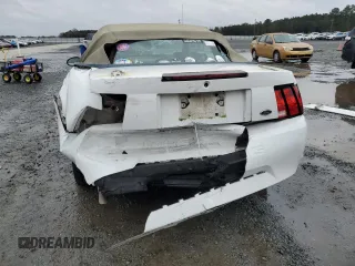 2004 Ford Mustang Deluxe with VIN 1FAFP446X4F179975, listed as a Copart auction lot 84551444 with 75,919 mi miles and Salvage Title. Bid and sale history available at carsss.com. Image 6.