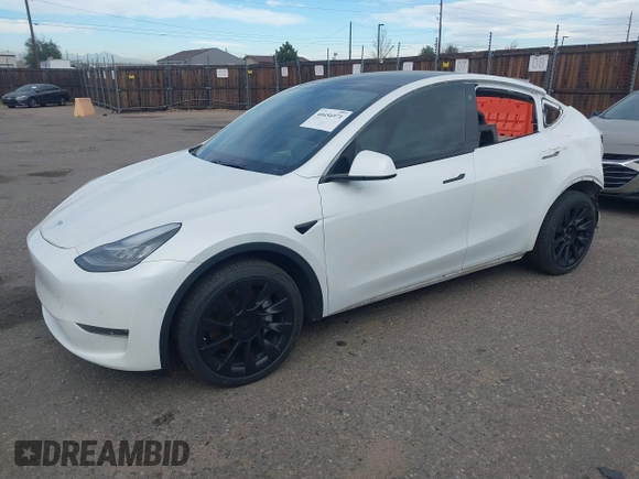2021 Tesla Model Y Long Range with VIN 5YJYGDEE2MF074246, listed as a IAAI auction lot 40456971 with 94,527 mi miles. Bid and sale history available at carsss.com. Image 19.