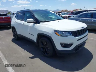 2021 Jeep Compass Latitude z VIN 3C4NJCBBXMT603940, wystawiony jako IAAI lot #42079547 z przebiegiem 70 076 mil mil oraz . Historia ofert i sprzedaży dostępna na DreamBid. Obrazek 1.