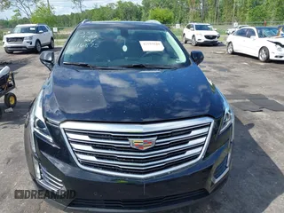 2017 Cadillac XT5 Luxury FWD z VIN 1GYKNBRS0HZ116875, wystawiony jako IAAI lot #42155840 z przebiegiem 47 625 mil mil oraz . Historia ofert i sprzedaży dostępna na DreamBid. Obrazek 12.