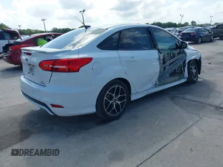 2016 Ford Focus SE with VIN 1FADP3F2XGL356462, listed as a IAAI auction lot 41941656 with 85,904 mi miles. Bid and sale history available at carsss.com. Image 4.