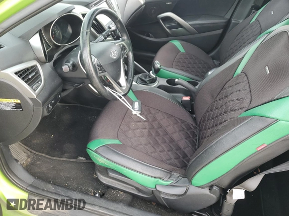 2012 Hyundai Veloster w/Red Int with VIN KMHTC6AD7CU081810, listed as a Copart auction lot 85392454 with 172,747 mi miles and Clean title. Bid and sale history available at DreamBid. Image 7.