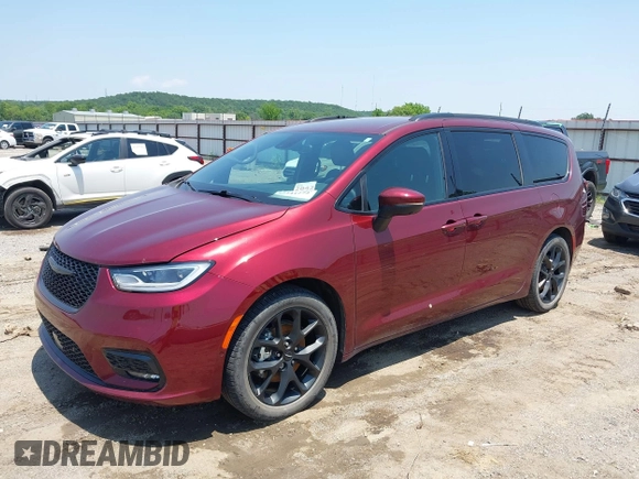 2023 Chrysler Pacifica Touring L with VIN 2C4RC1BG7PR513017, listed as a IAAI auction lot 42441272 with 23,310 mi miles and . Bid and sale history available at DreamBid. Image 2.