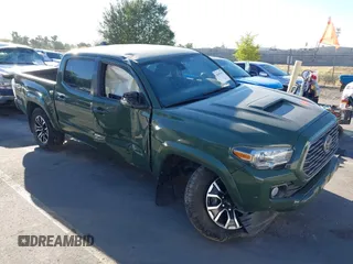 2021 Toyota Tacoma SR z VIN 3TYCZ5AN2MT039450, wystawiony jako IAAI lot #40457613 z przebiegiem 54 176 mil mil oraz . Historia ofert i sprzedaży dostępna na DreamBid. Obrazek 1.