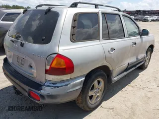 2004 Hyundai Santa Fe GLS with VIN KM8SC13DX4U592070, listed as a IAAI auction lot 42030363 with 296,823 mi miles. Bid and sale history available at carsss.com. Image 4.