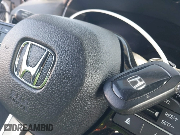 2024 Honda Civic Si z VIN 2HGFE1E54RH470452, wystawiony jako IAAI lot #41146132 z przebiegiem 18 620 mil mil oraz . Historia ofert i sprzedaży dostępna na DreamBid. Obrazek 11.