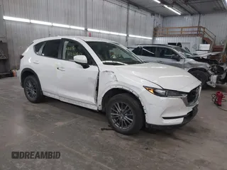 2017 Mazda CX-5 Touring with VIN JM3KFBCL9H0107589, listed as a IAAI auction lot 41241481 with 77,032 mi miles. Bid and sale history available at carsss.com. Image 1.