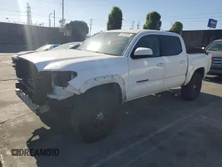 2018 Toyota Tacoma SR with VIN 5TFAX5GN7JX113399, listed as a Copart auction lot 57873035 with 186,763 mi miles and Salvage title. Bid and sale history available at DreamBid. Image 1.