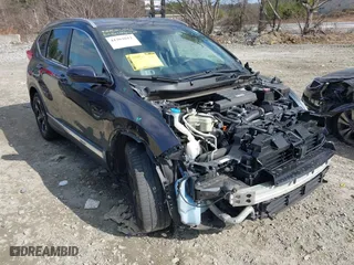 2019 Honda CR-V Touring with VIN 7FARW1H99KE012879, listed as a IAAI auction lot 41362612 with 108,305 mi miles. Bid and sale history available at carsss.com. Image 1.