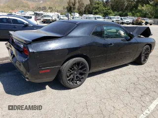 2011 Dodge Challenger z VIN 2B3CJ4DGXBH604602, wystawiony jako Copart lot #60917935 z przebiegiem Nie podano mil oraz Szkoda całkowita • Salvage title. Historia ofert i sprzedaży dostępna na DreamBid. Obrazek 3.