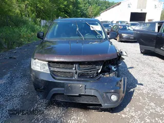 2013 Dodge Journey R/T with VIN 3C4PDDEG4DT691056, listed as a IAAI auction lot 42535196 with 198,307 mi miles and . Bid and sale history available at DreamBid. Image 12.