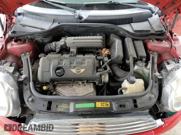 2009 MINI Hardtop with VIN WMWMF33519TW77558, listed as a Copart auction lot 54556785 with 97,749 mi miles and Salvage Title. Bid and sale history available at DreamBid. Image 11.