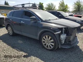 2010 Mazda CX-9 Grand Touring with VIN JM3TB3MV8A0235690, listed as a Copart auction lot 60153975 with 146,736 mi miles and Salvage title. Bid and sale history available at DreamBid. Image 4.