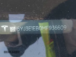 2021 Tesla Model 3 Long Range z VIN 5YJ3E1EB0MF936609, wystawiony jako IAAI lot #41599411 z przebiegiem 55 993 mil mil oraz . Historia ofert i sprzedaży dostępna na DreamBid. Obrazek 9.
