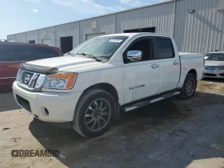 2014 Nissan Titan SV with VIN 1N6AA0EK9EN506977, listed as a Copart auction lot 62453325 with 156,982 mi miles and Salvage title. Bid and sale history available at DreamBid. Image 1.