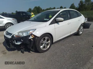2013 Ford Focus SE with VIN 1FADP3F28DL215983, listed as a IAAI auction lot 42659890 with 117,912 mi miles and . Bid and sale history available at DreamBid. Image 2.