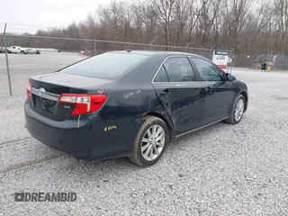 2014 Toyota Camry SE with VIN 4T1BK1FK7EU548333, listed as a IAAI auction lot 41598278 with 119,534 mi miles. Bid and sale history available at carsss.com. Image 4.