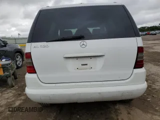 2001 Mercedes-Benz M 320/430/500 with VIN 4JGAB54E51A277087, listed as a Copart auction lot 58258675 with 221,151 mi miles and Salvage title. Bid and sale history available at DreamBid. Image 6.